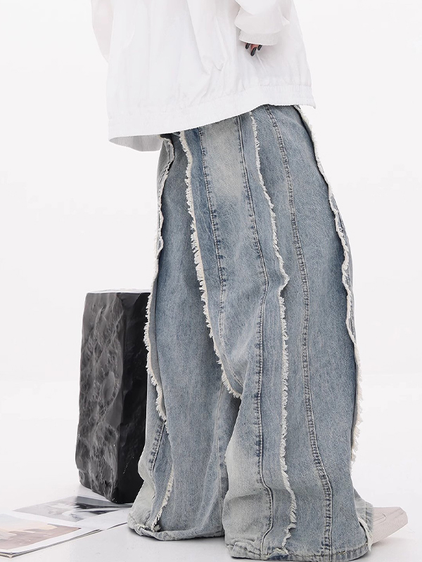 Jeans acampanados con diseño de borde sin rematar y perneras anchas-1